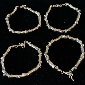 Lot of 4 Silver-Tone Bracelets with Lobster Clasp Closure
